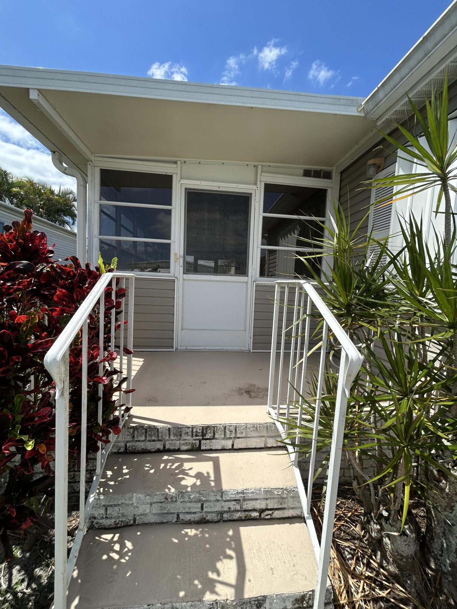 400 North Hwy A1A, Unit 47 Jupiter, FL 33477 - Photo 4 of 35 a view of entryway front of house