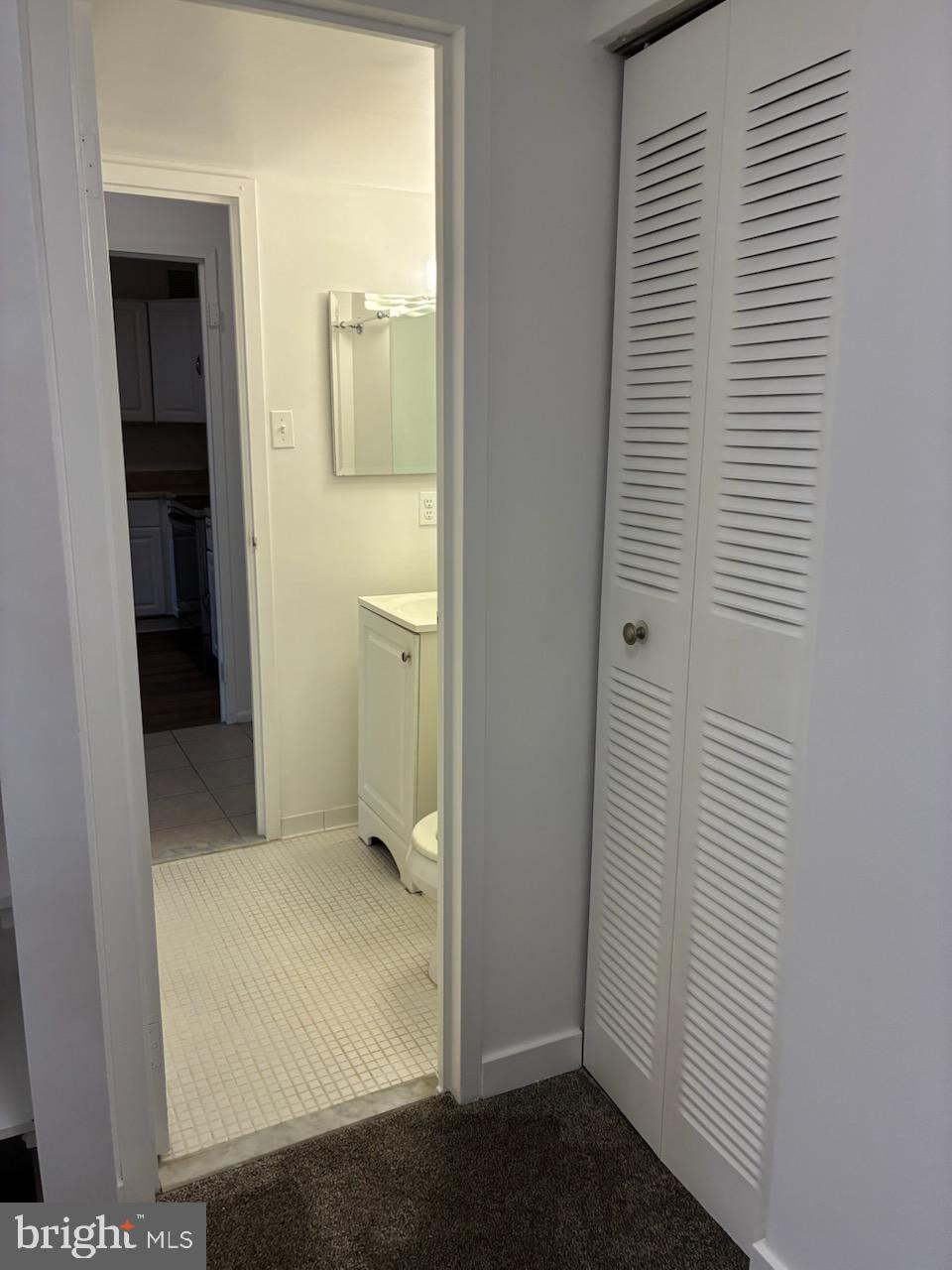 6800 Fleetwood Road, Unit 705 McLean, VA 22101 - Photo 5 of 13 Hallway view from bathroom