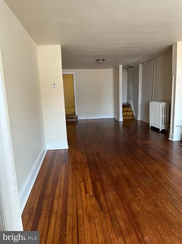 a view of livingroom with furniture and wooden floor