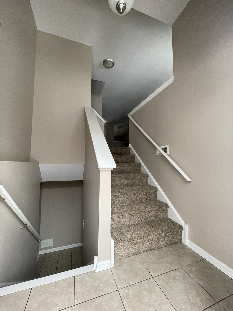 578 Triumph Court, Unit 578 Hainesville, IL 60073 - Photo 3 of 20 a view of entryway and hall