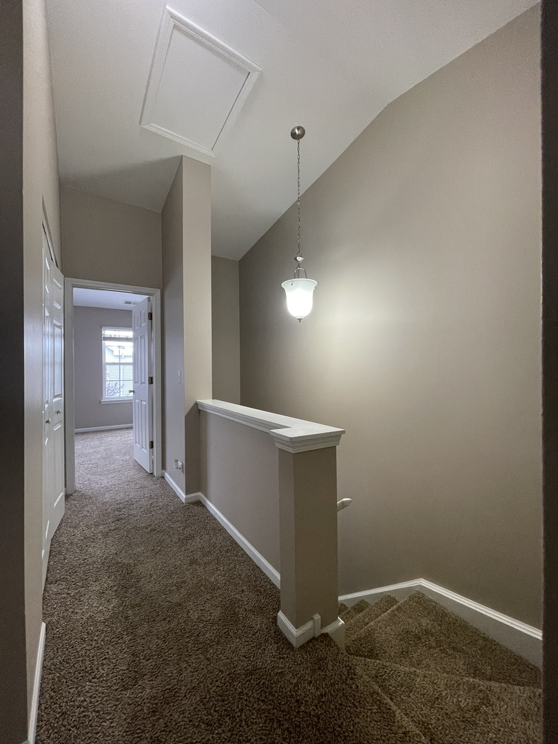 578 Triumph Court, Unit 578 Hainesville, IL 60073 - Photo 10 of 20 a view of an empty room