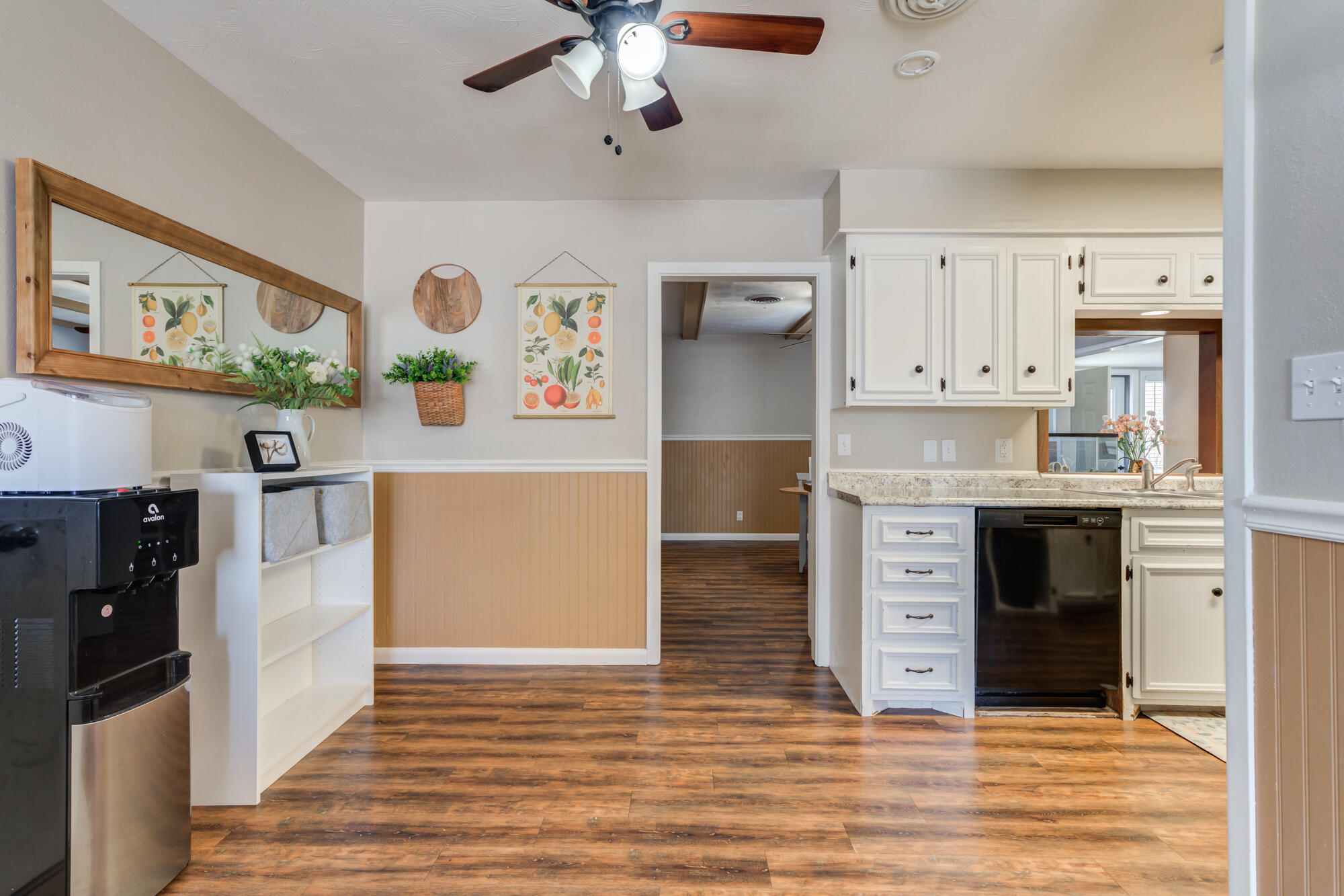 1912 69th Street Lubbock, TX 79412 - Photo 15 of 41 a kitchen with stainless steel appliances granite countertop a refrigerator and a stove top oven