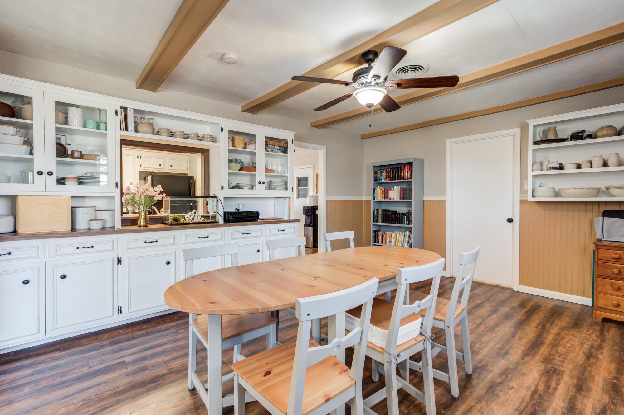 1912 69th Street Lubbock, TX 79412 - Photo 20 of 41 a large kitchen with a table and chairs