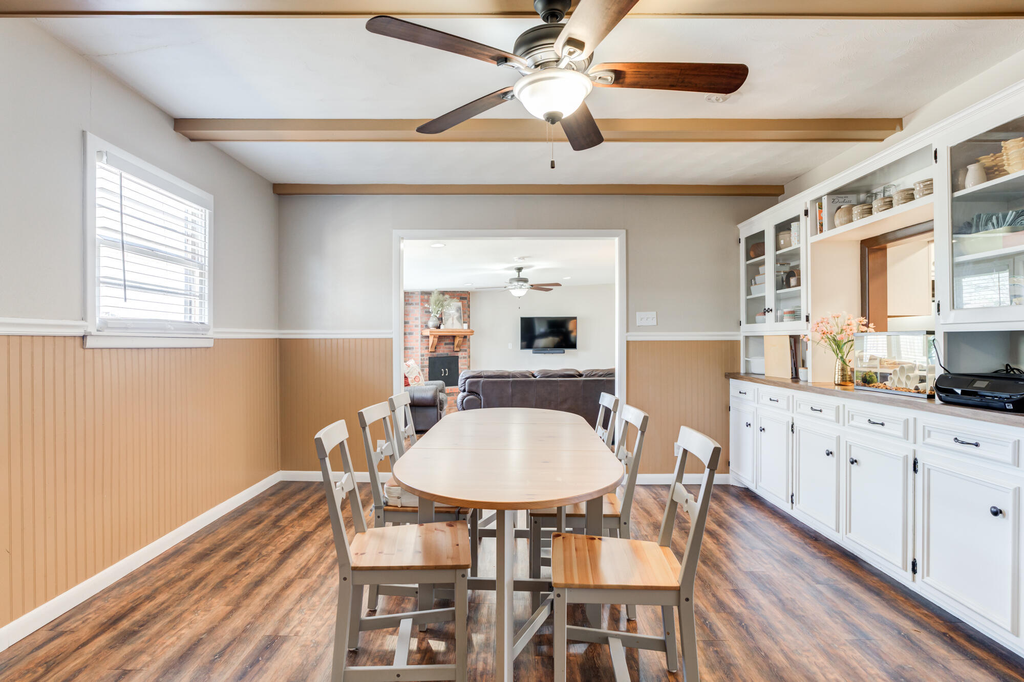 1912 69th Street Lubbock, TX 79412 - Photo 21 of 41 a view of a dining room with furniture and wooden floor