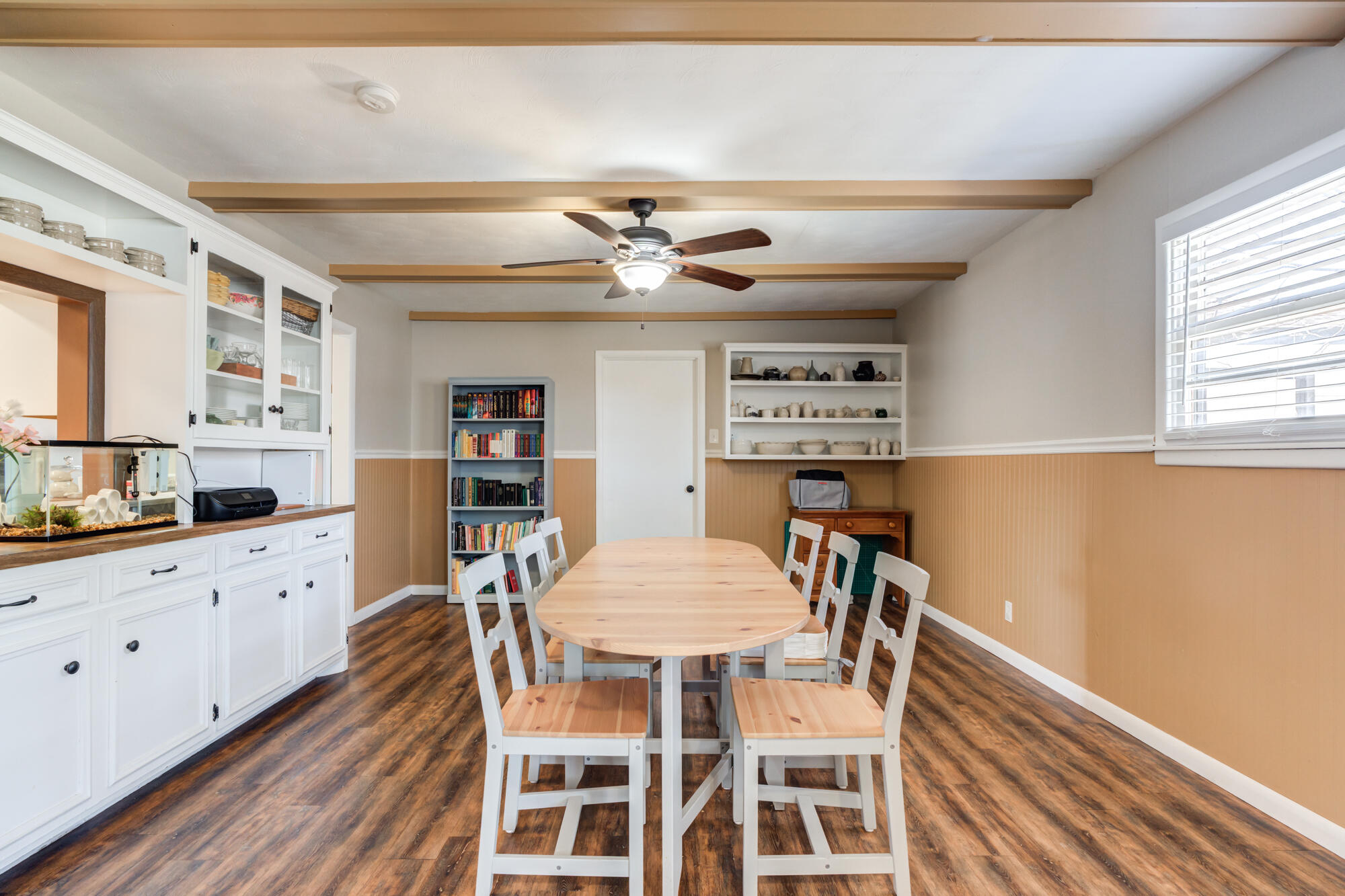 1912 69th Street Lubbock, TX 79412 - Photo 22 of 41 a view of a dining room with furniture and window