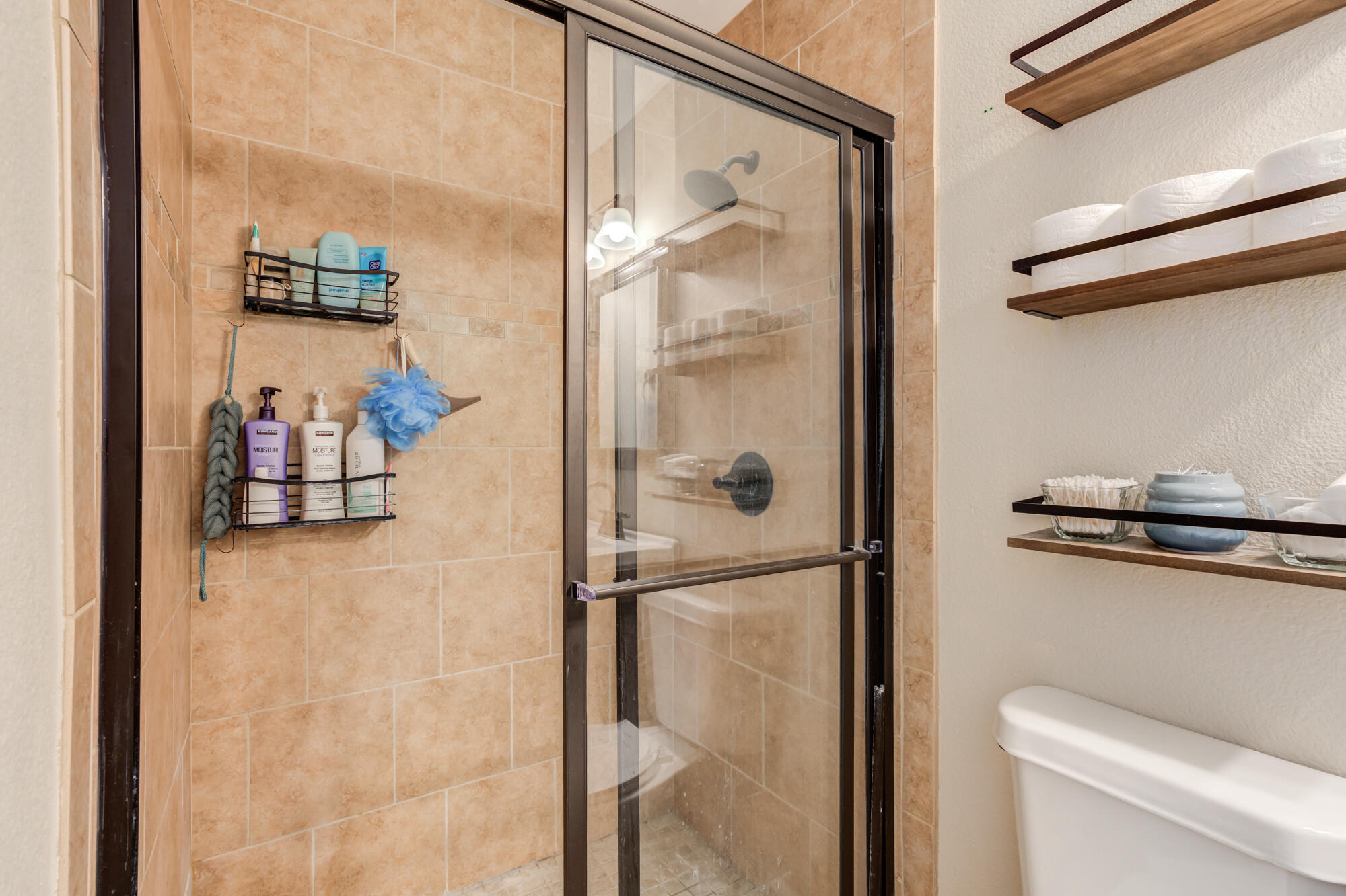 1912 69th Street Lubbock, TX 79412 - Photo 27 of 41 a bathroom with a shower