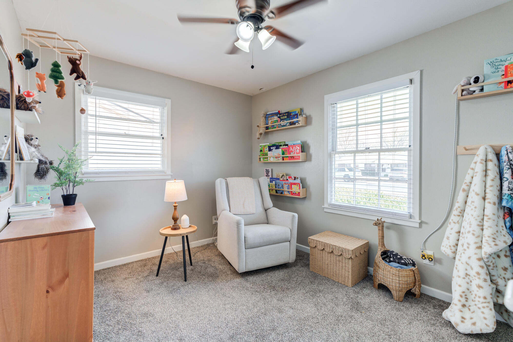 1912 69th Street Lubbock, TX 79412 - Photo 31 of 41 a living room with furniture and a window