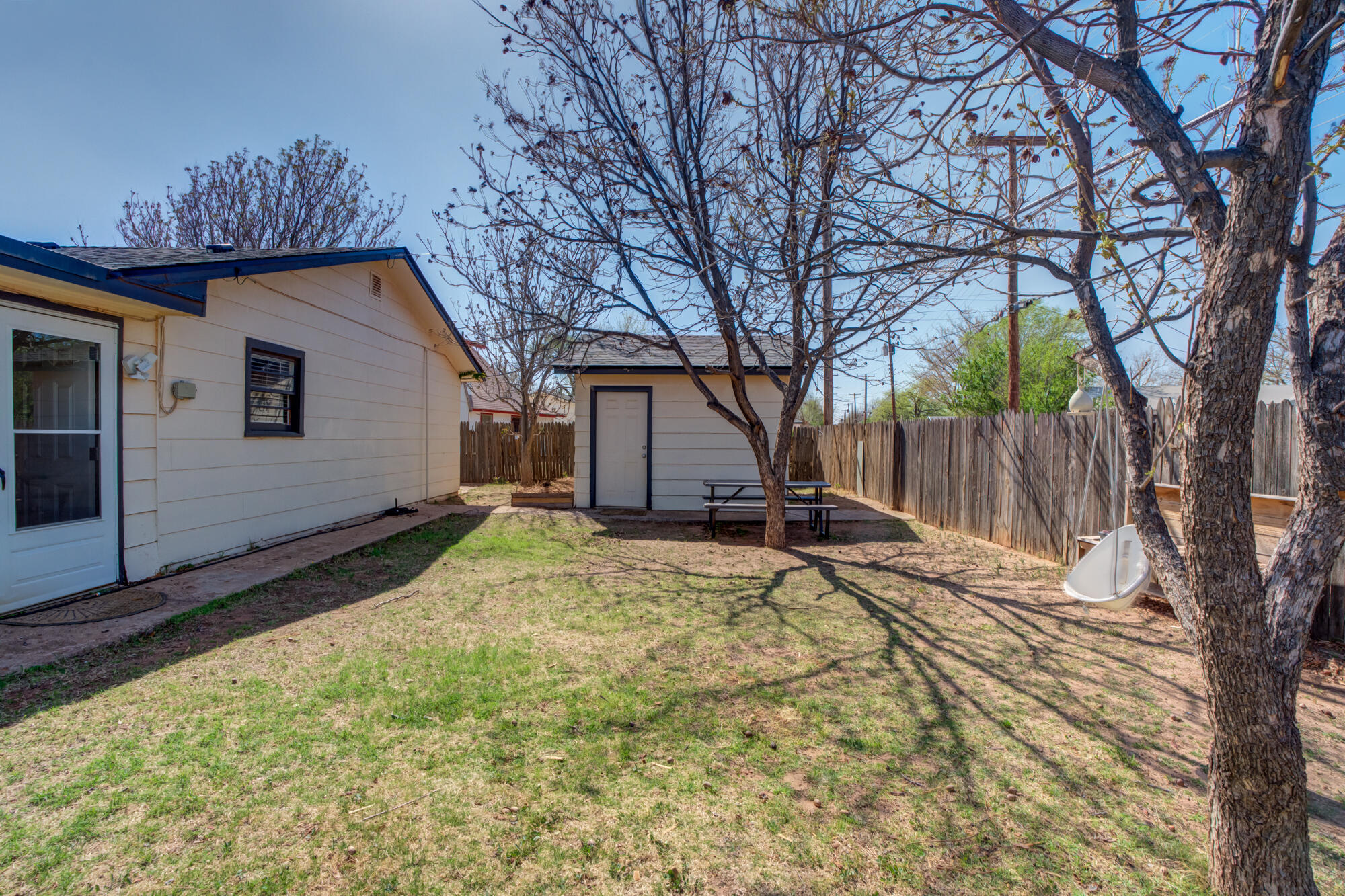 1912 69th Street Lubbock, TX 79412 - Photo 38 of 41 a house view with a backyard space