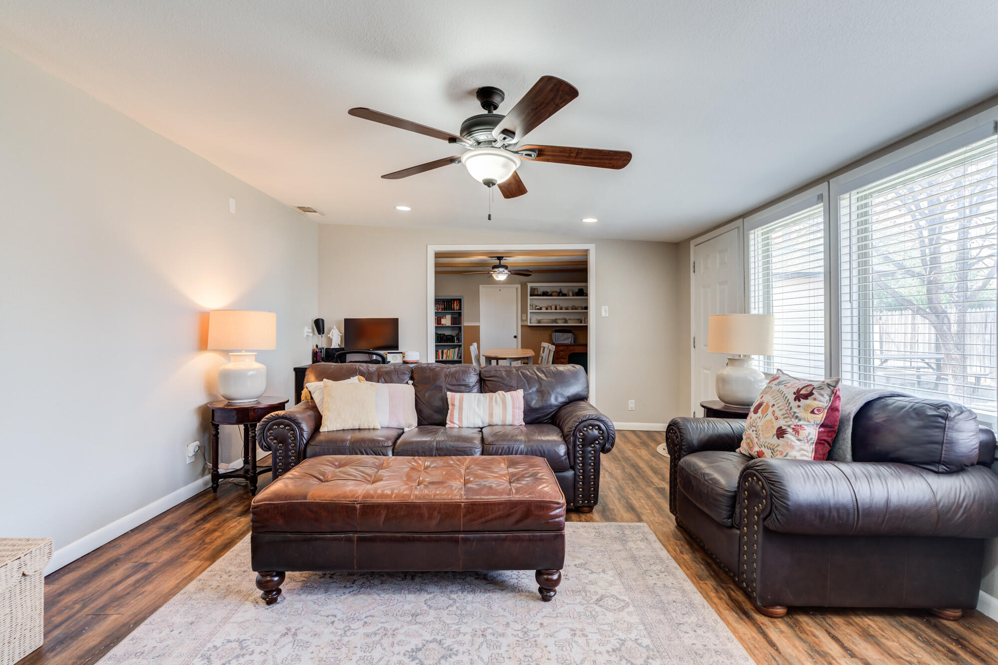 1912 69th Street Lubbock, TX 79412 - Photo 8 of 41 a living room with furniture and a large window