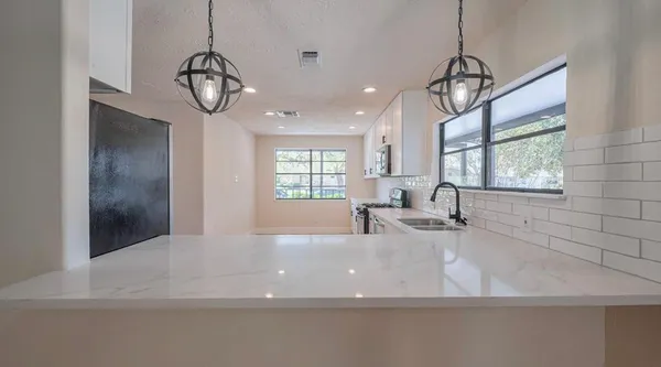 a view of a living room and a window