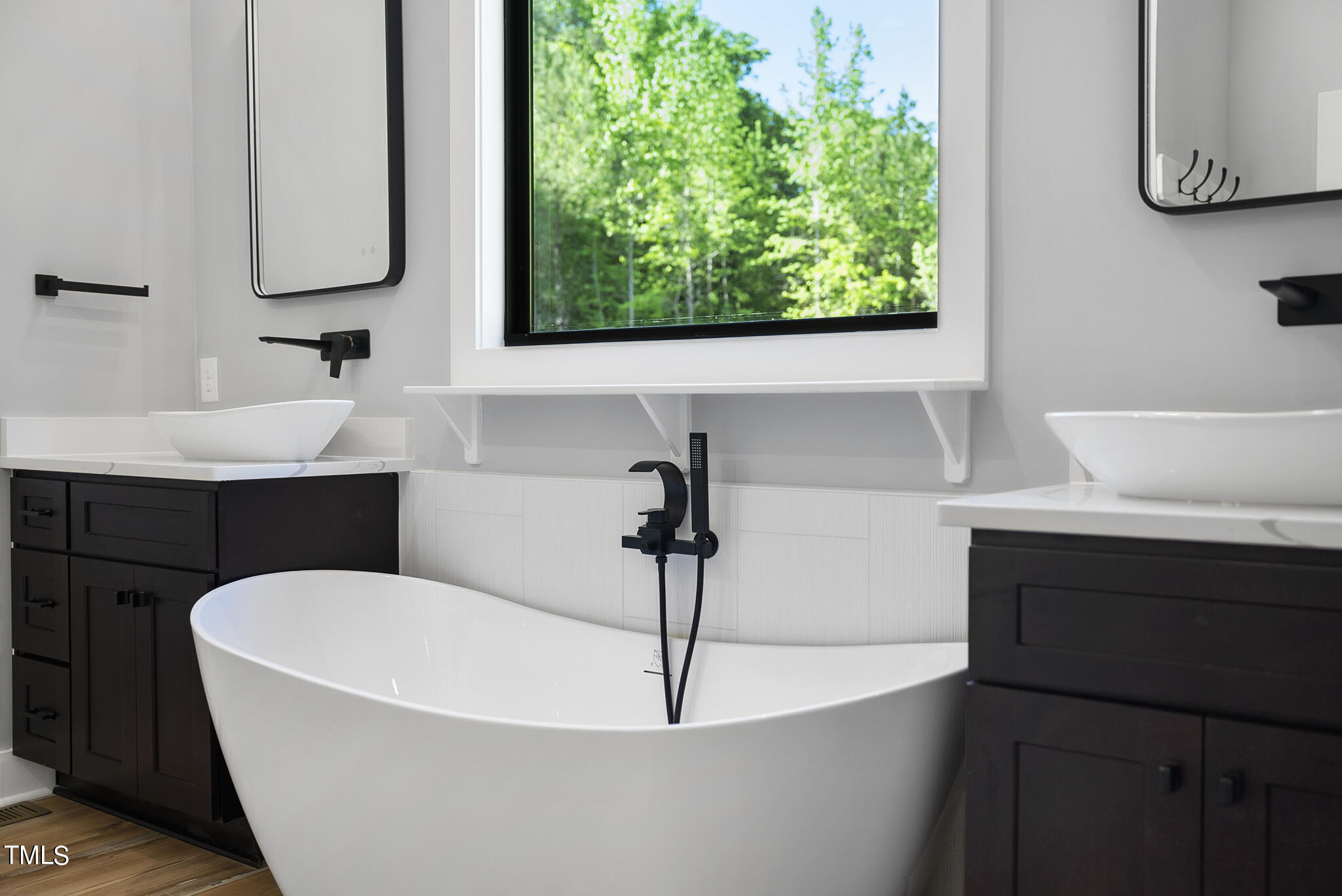 190 Pilot Ridge Road Zebulon, NC 27597 - Photo 30 of 55 a bathroom with a sink and a mirror