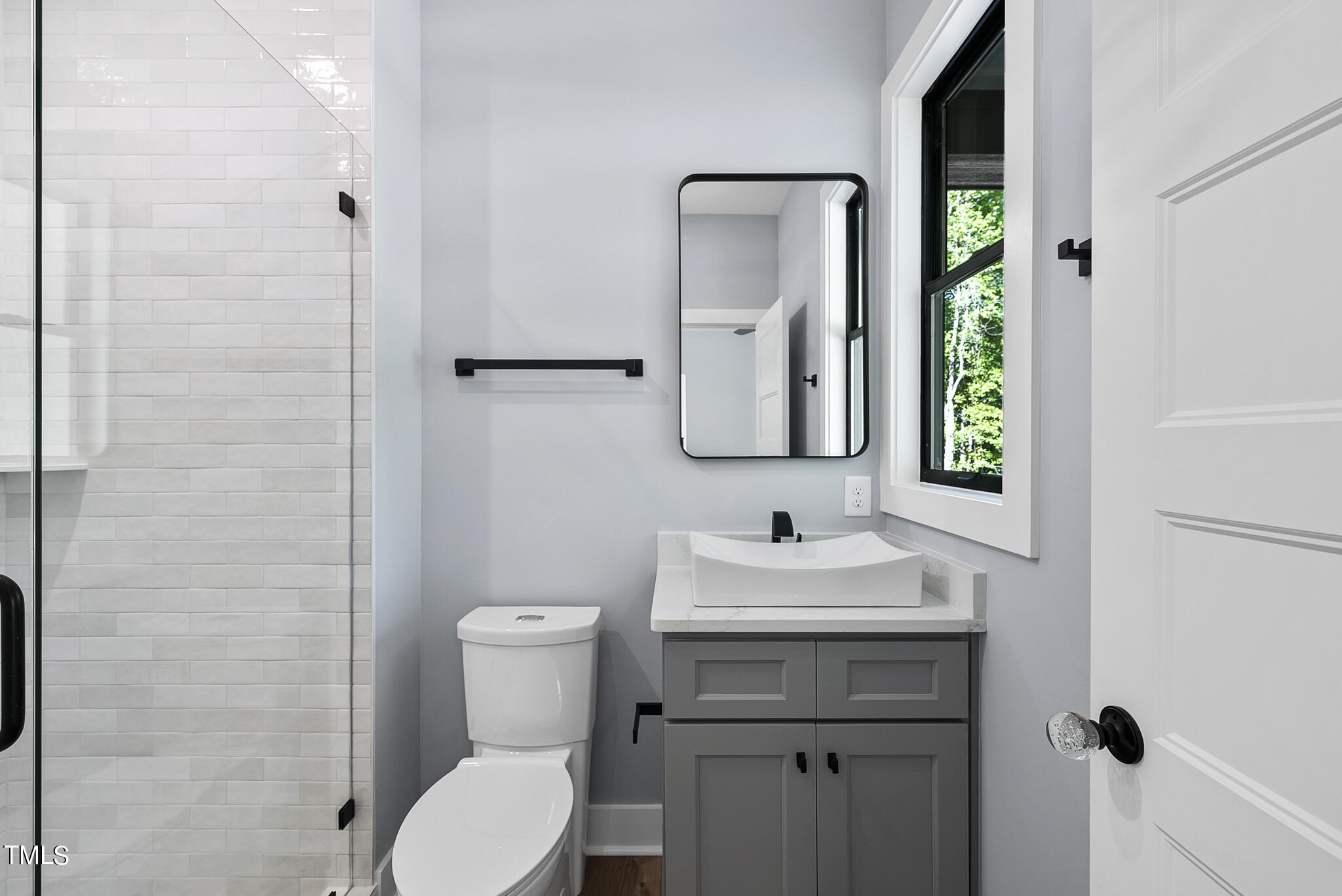 190 Pilot Ridge Road Zebulon, NC 27597 - Photo 39 of 55 a bathroom with a toilet sink and mirror