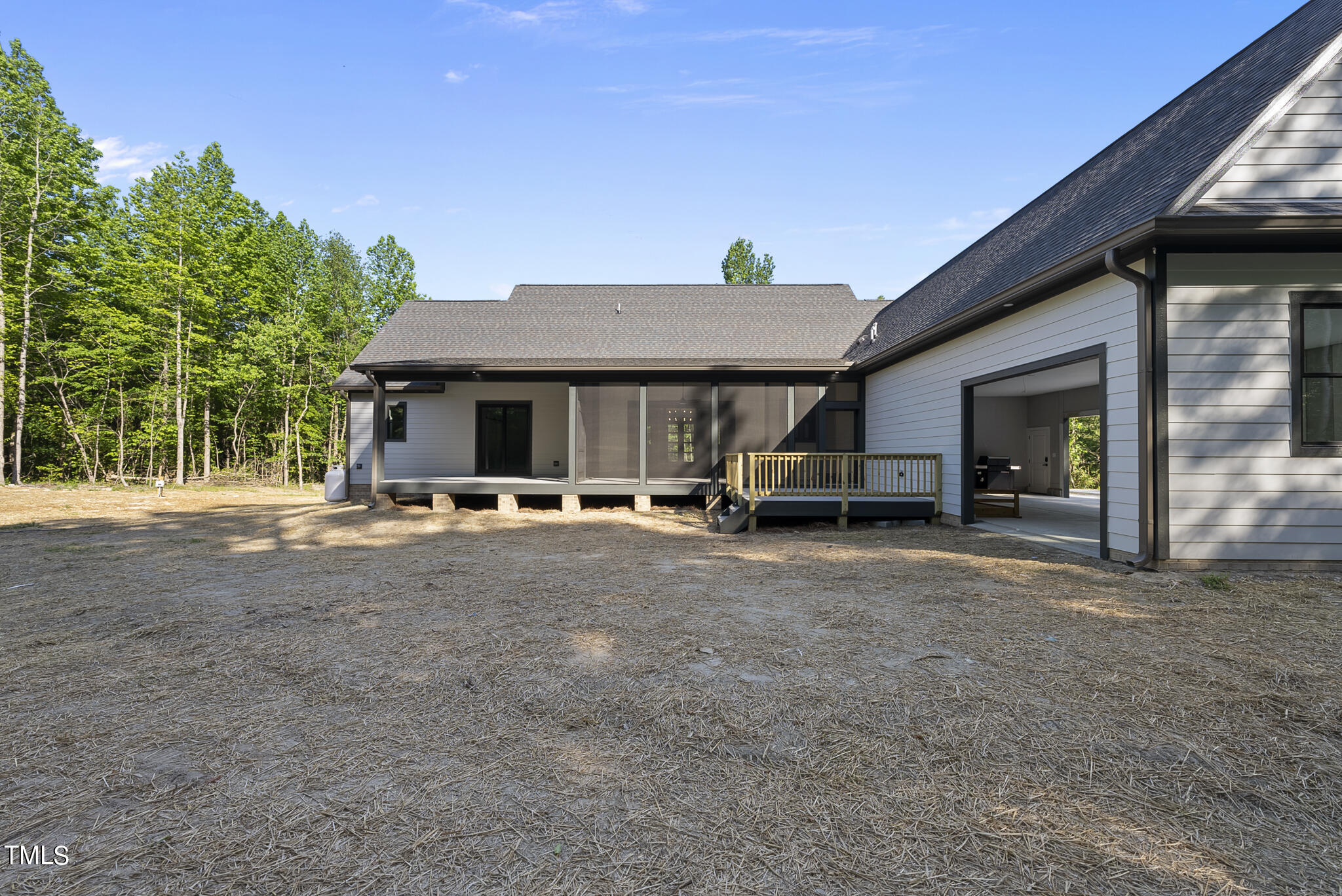 190 Pilot Ridge Road Zebulon, NC 27597 - Photo 54 of 55 a view of a house with backyard and porch