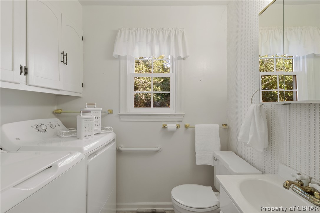 549 Long Point Lane Topping, VA 23169 - Photo 17 of 48 Laundry room with a half bath