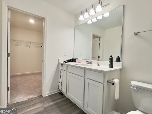 a view of a room with racks on the wall