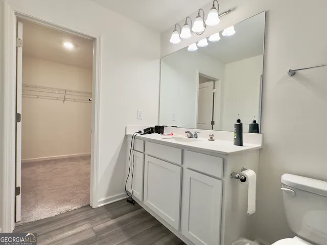 a view of a room with racks on the wall