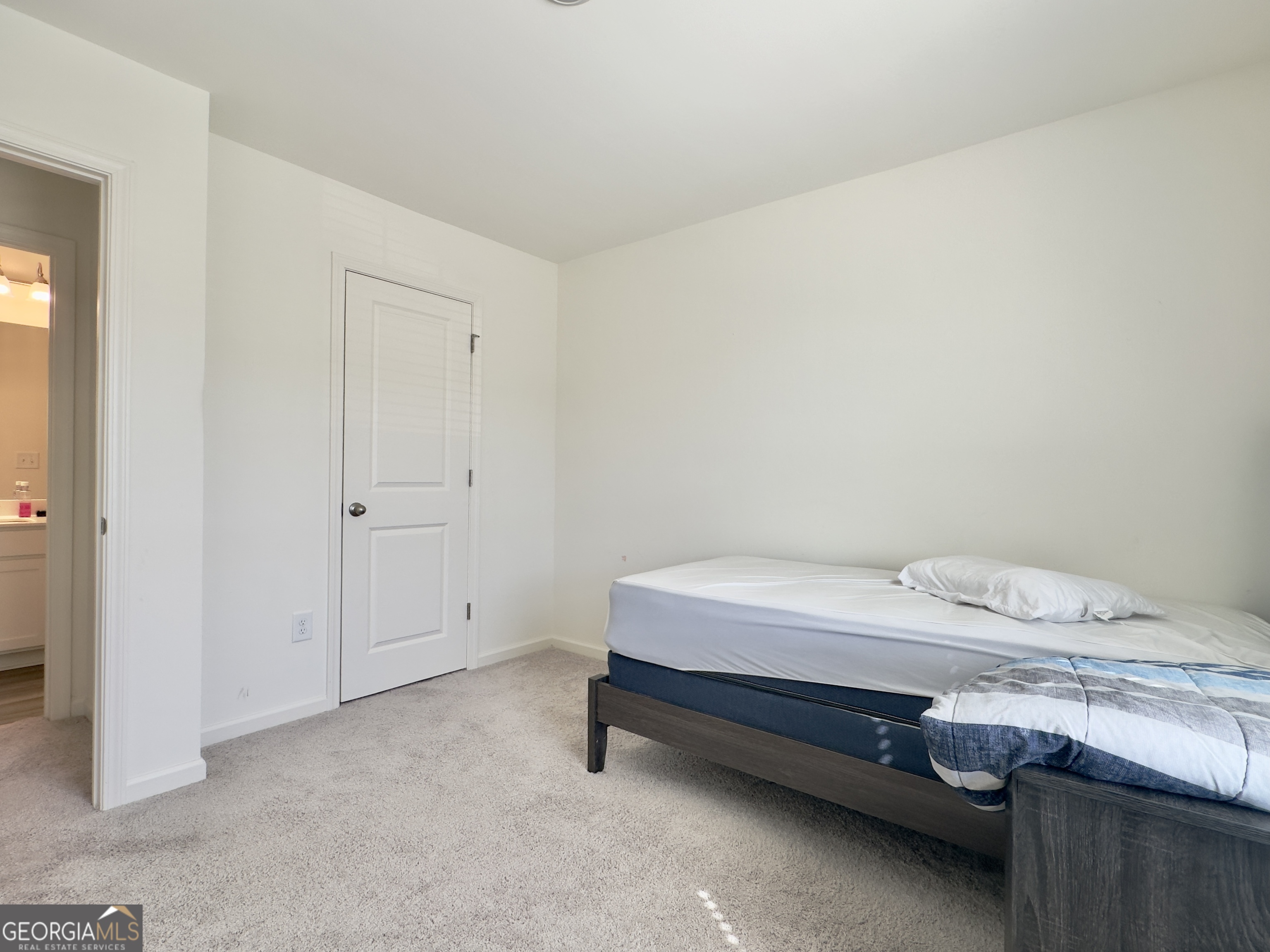 107 Ellicott Way Cartersville, GA 30120 - Photo 22 of 25 a bedroom with a bed and a window