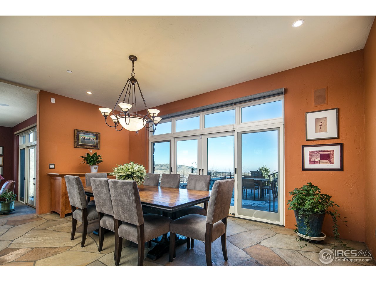 355 Mountain King Road Boulder, CO 80302 - Photo 12 of 34 a view of a dining room with furniture and chandelier