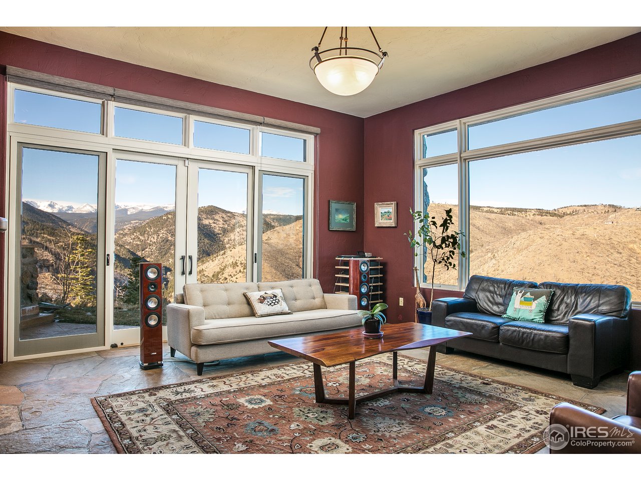 355 Mountain King Road Boulder, CO 80302 - Photo 14 of 34 a living room with furniture and a large window
