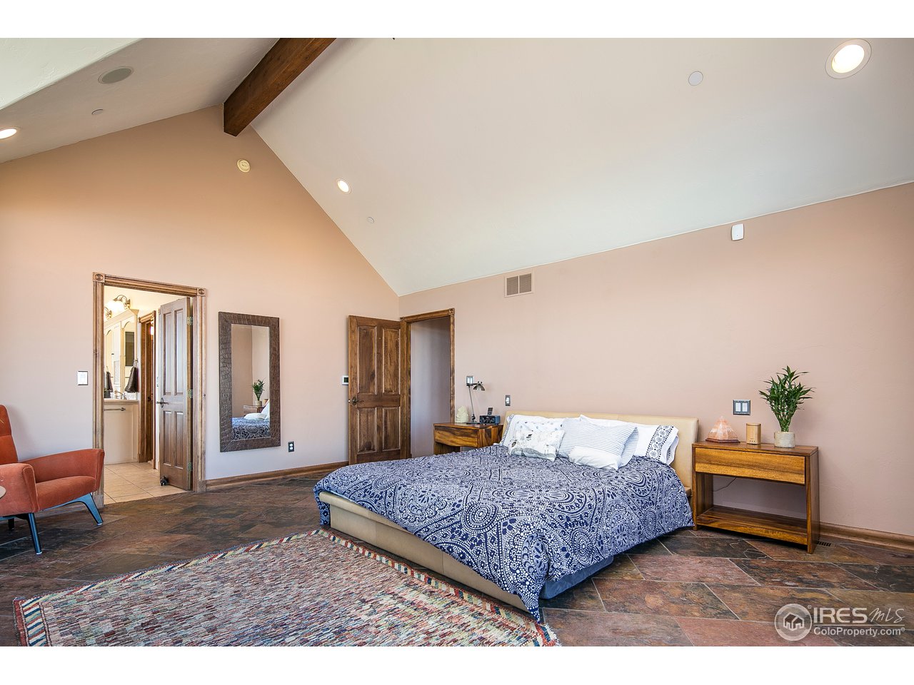 355 Mountain King Road Boulder, CO 80302 - Photo 17 of 34 a bedroom with a bed and window