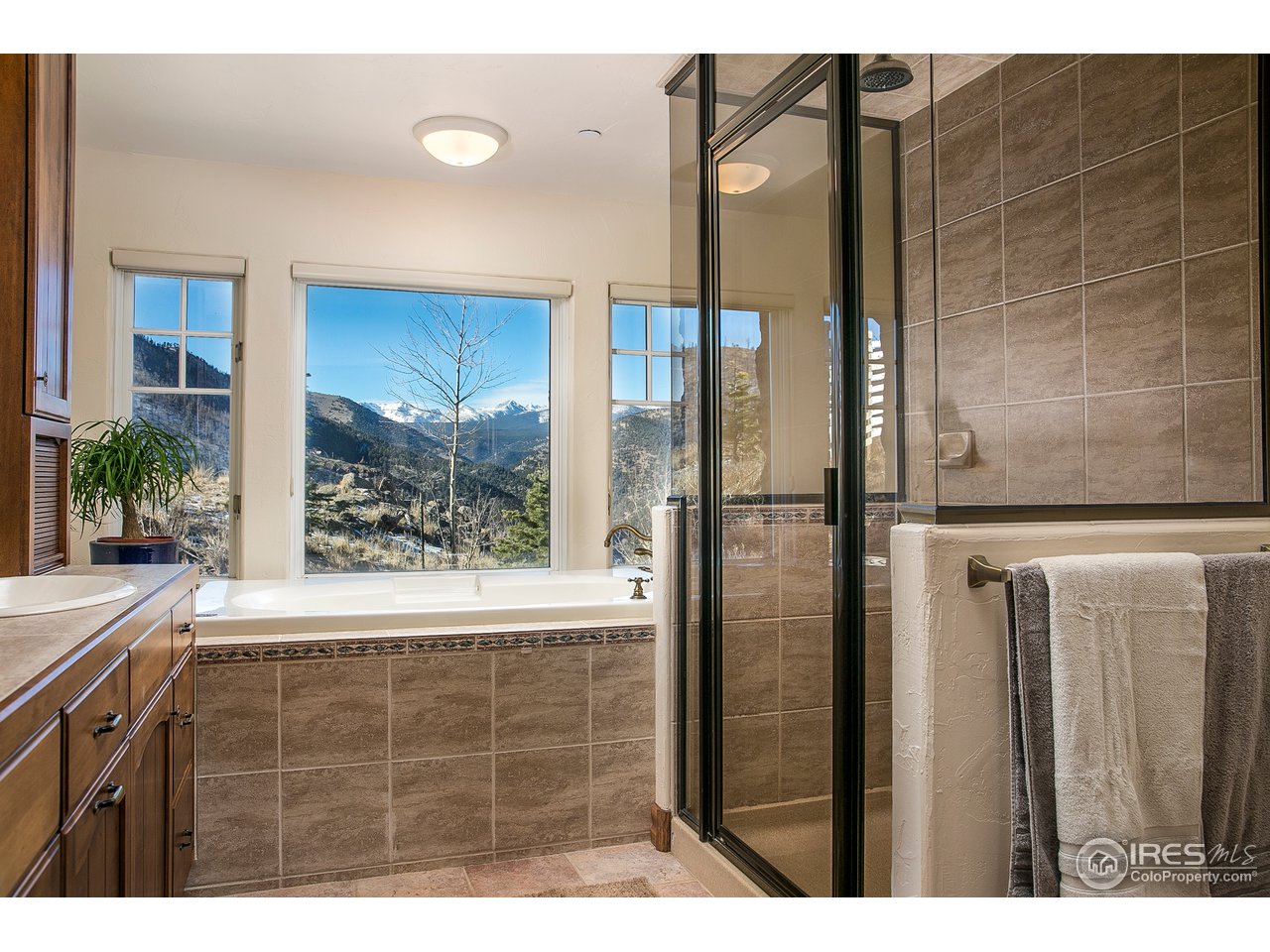 355 Mountain King Road Boulder, CO 80302 - Photo 27 of 34 a bathroom with a shower and a sink