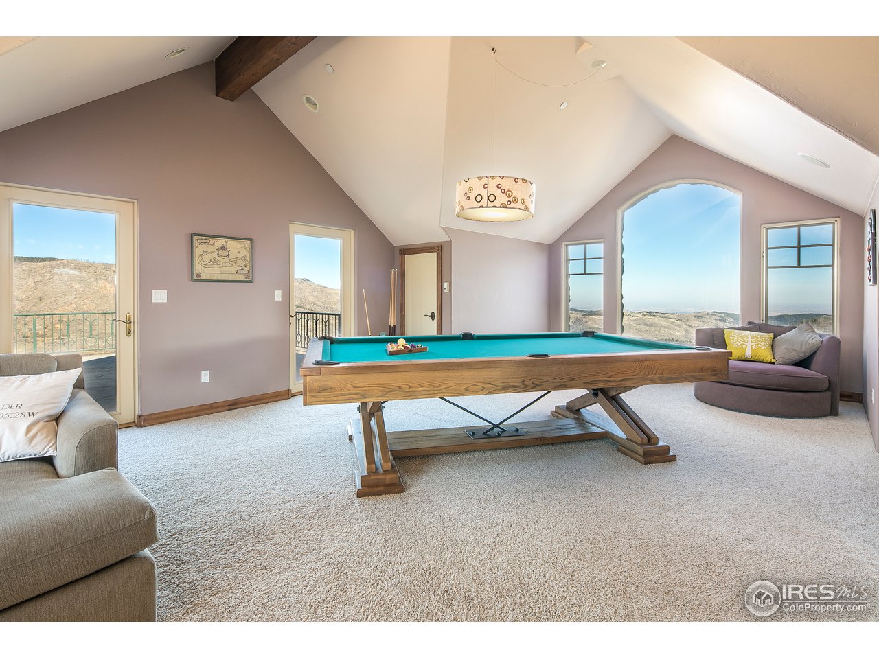 355 Mountain King Road Boulder, CO 80302 - Photo 29 of 34 a living room with furniture pool and a window