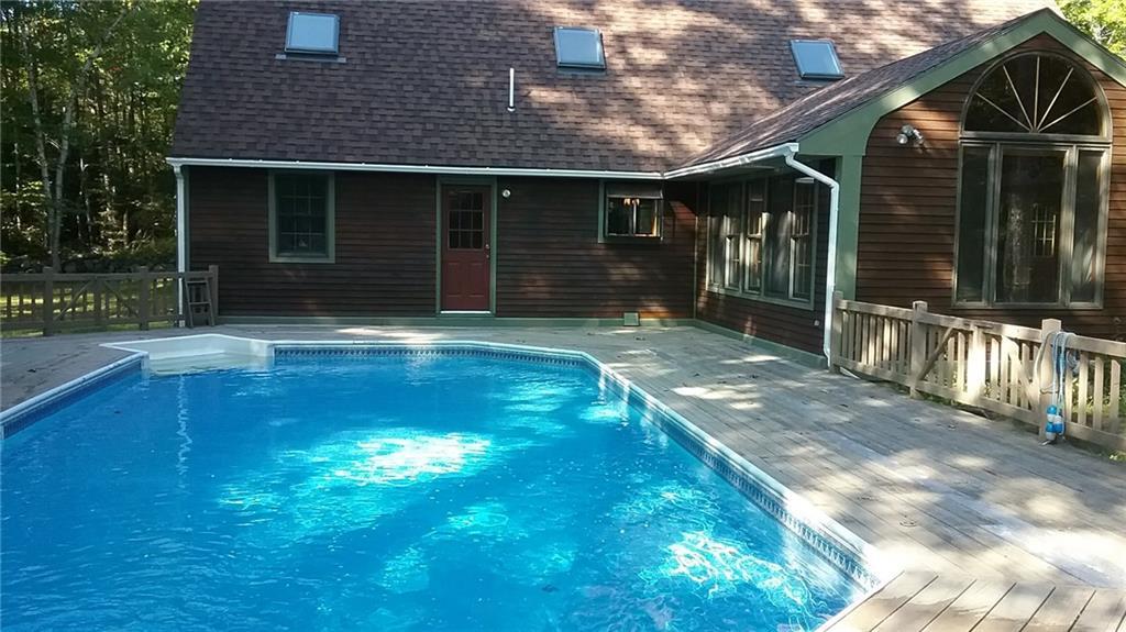 214 Desert Pond Road Mount Vernon, ME 04352 - Photo 20 of 24 pool and rear exterior of house
