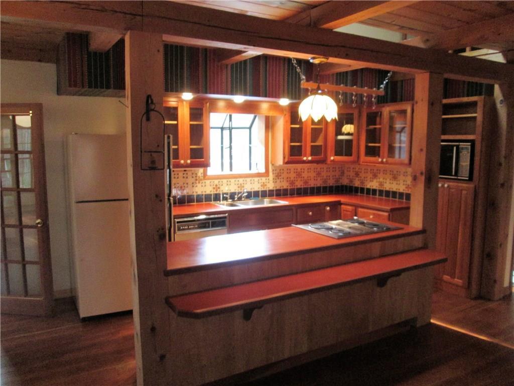 214 Desert Pond Road Mount Vernon, ME 04352 - Photo 7 of 24 eat-in kitchen with island, tiled...