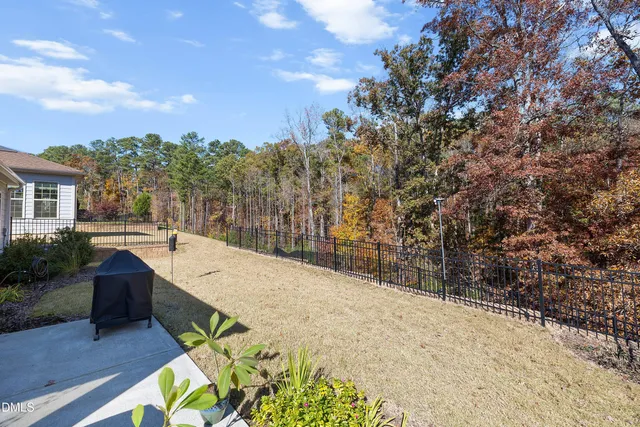 an aerial view of a house with a garden