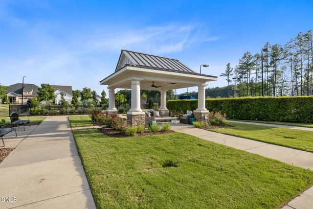 a kitchen with a sink and a stove top oven