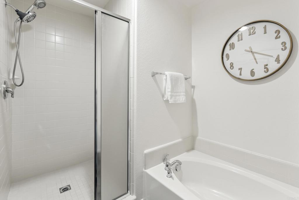 1276 San Elijo Road South San Marcos, CA 92078 - Photo 15 of 34 a bathroom with a bathtub and a shower