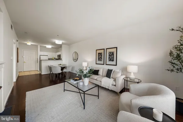 a living room with furniture and a couch