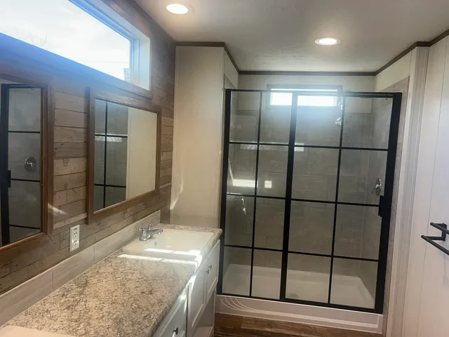 a bathroom with a sink and a mirror