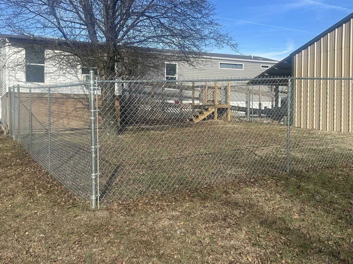 3115 Tunnel Hill Road Ozark, IL 62972 - Photo 7 of 36 a view of a porch with a table and chairs