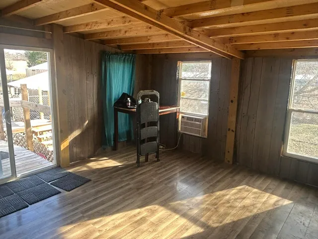 a view of entryway with wooden floor