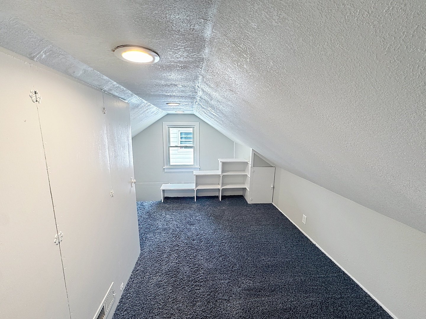 1841 32nd Street Moline, IL 61265 - Photo 12 of 24 a view of a livingroom with wooden floor and white walls