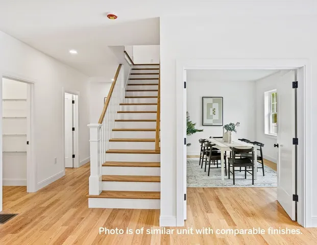 a view of a living room and dining room
