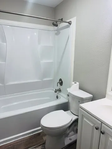 a bathroom with a sink and a toilet