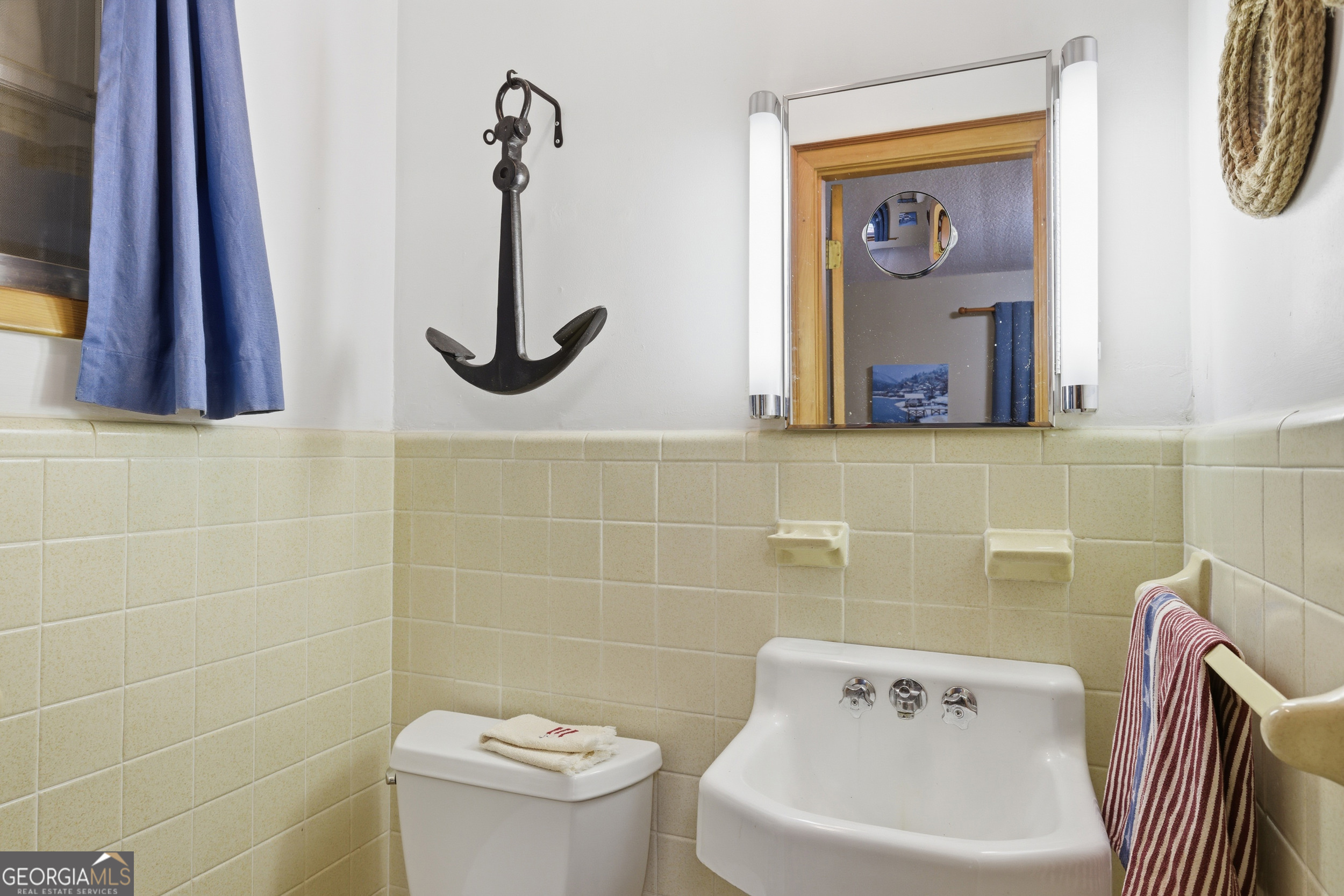 620 Timpson Cove Road Clayton, GA 30525 - Photo 15 of 32 a bathroom with a sink and a toilet