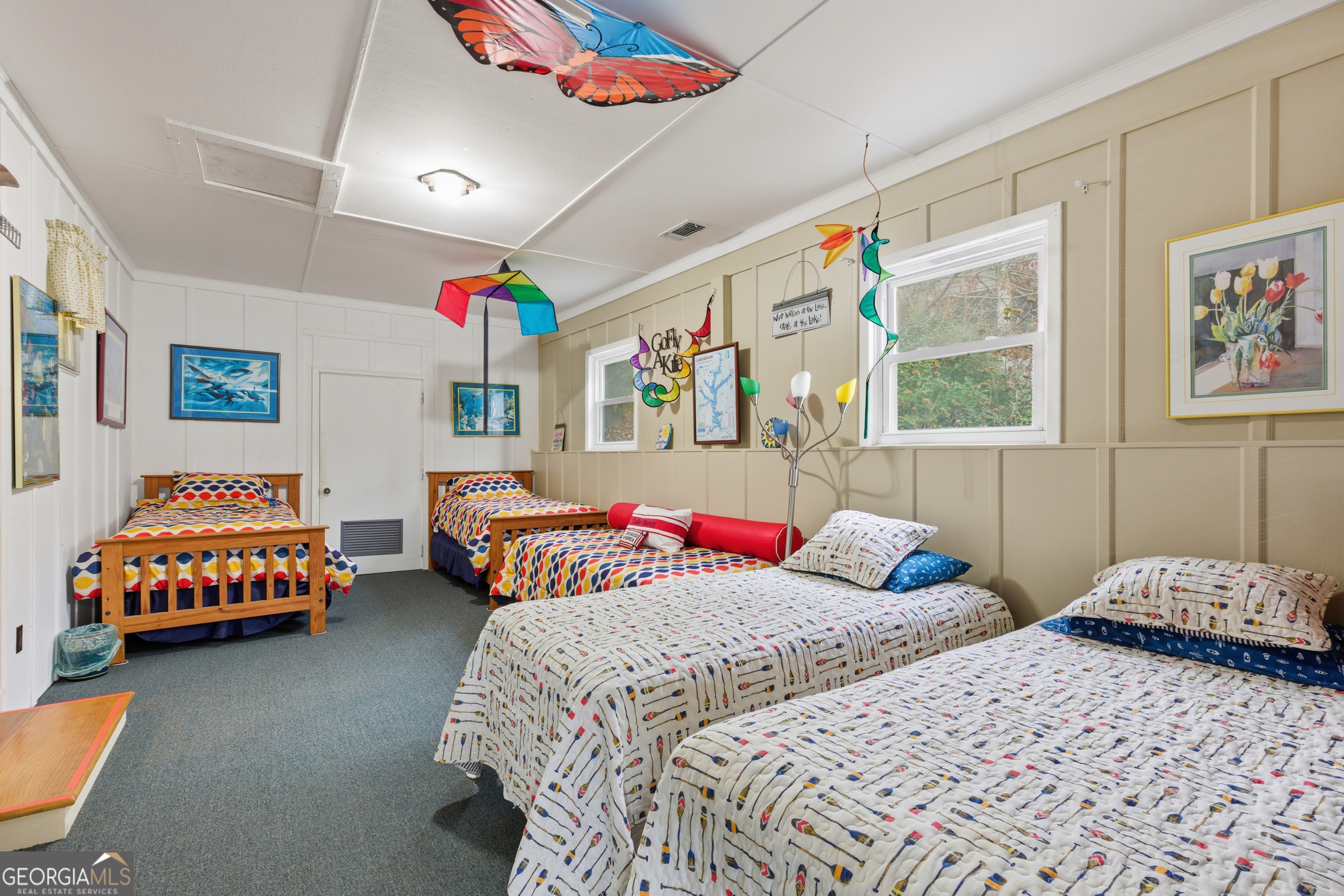 620 Timpson Cove Road Clayton, GA 30525 - Photo 19 of 32 a bedroom with two beds and painted walls