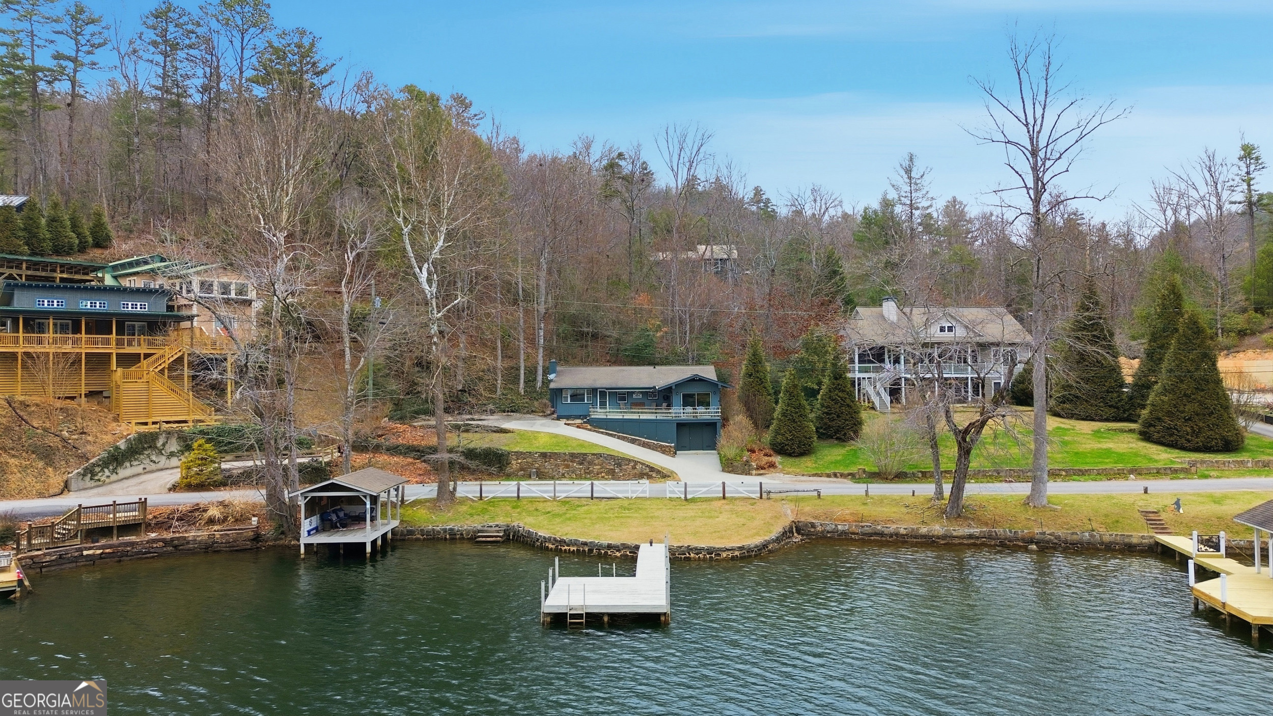 620 Timpson Cove Road Clayton, GA 30525 - Photo 2 of 32 a swimming pool with outdoor seating and yard