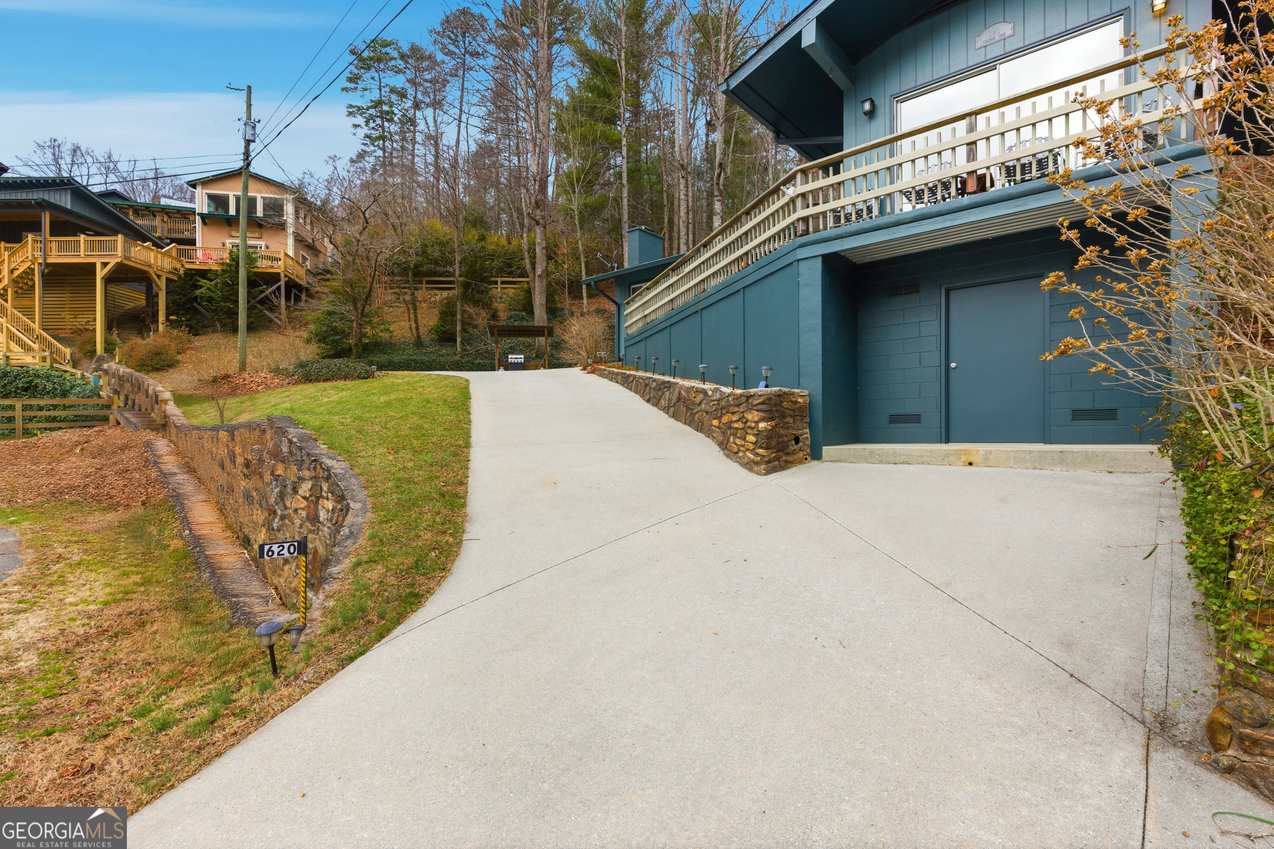 620 Timpson Cove Road Clayton, GA 30525 - Photo 22 of 32 a view of a building with many windows