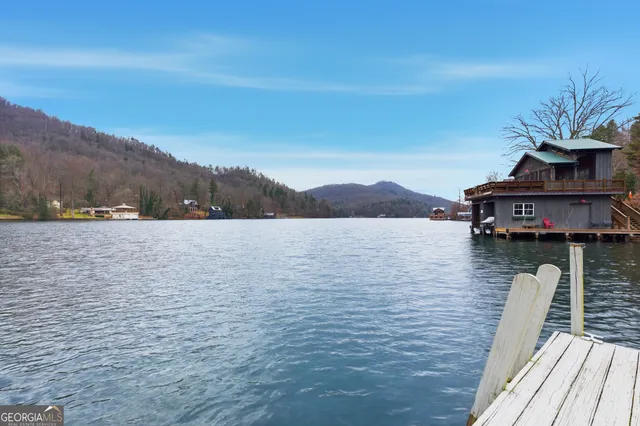 a view of a terrace with a lake view
