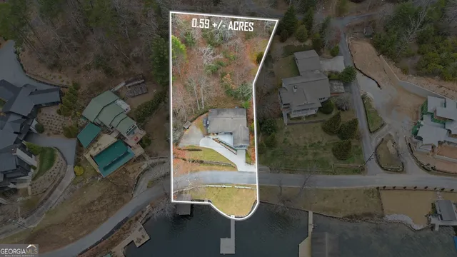 an aerial view of a highlighted house