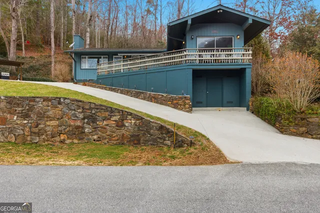 a view of a house with a swimming pool