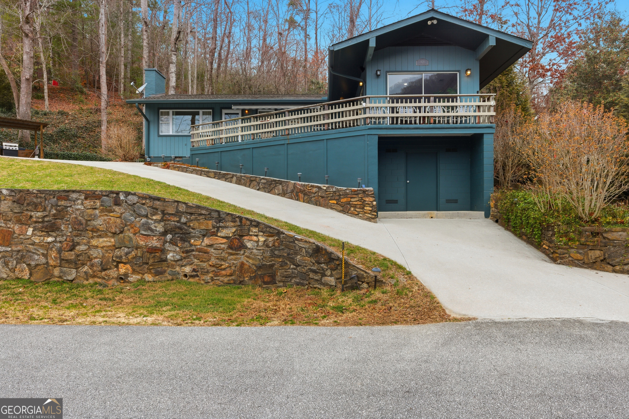 620 Timpson Cove Road Clayton, GA 30525 - Photo 5 of 32 a view of a house with a swimming pool