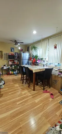 a living room filled with furniture and a table