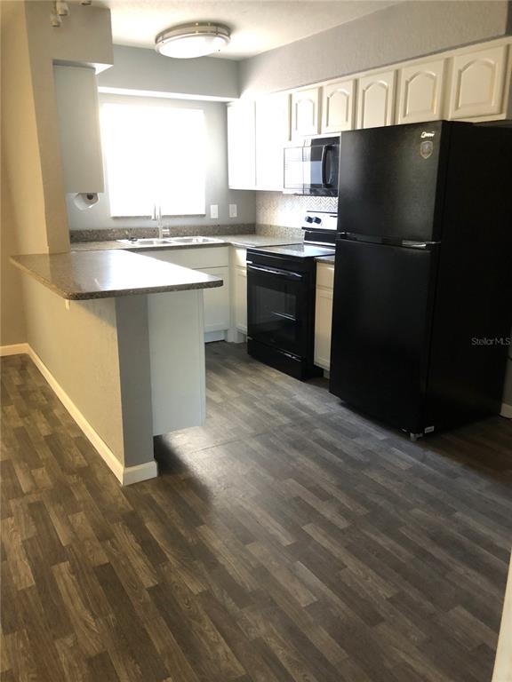 9030 Blind Pass Road, Unit C10 St. Petersburg, FL 33706 - Photo 3 of 14