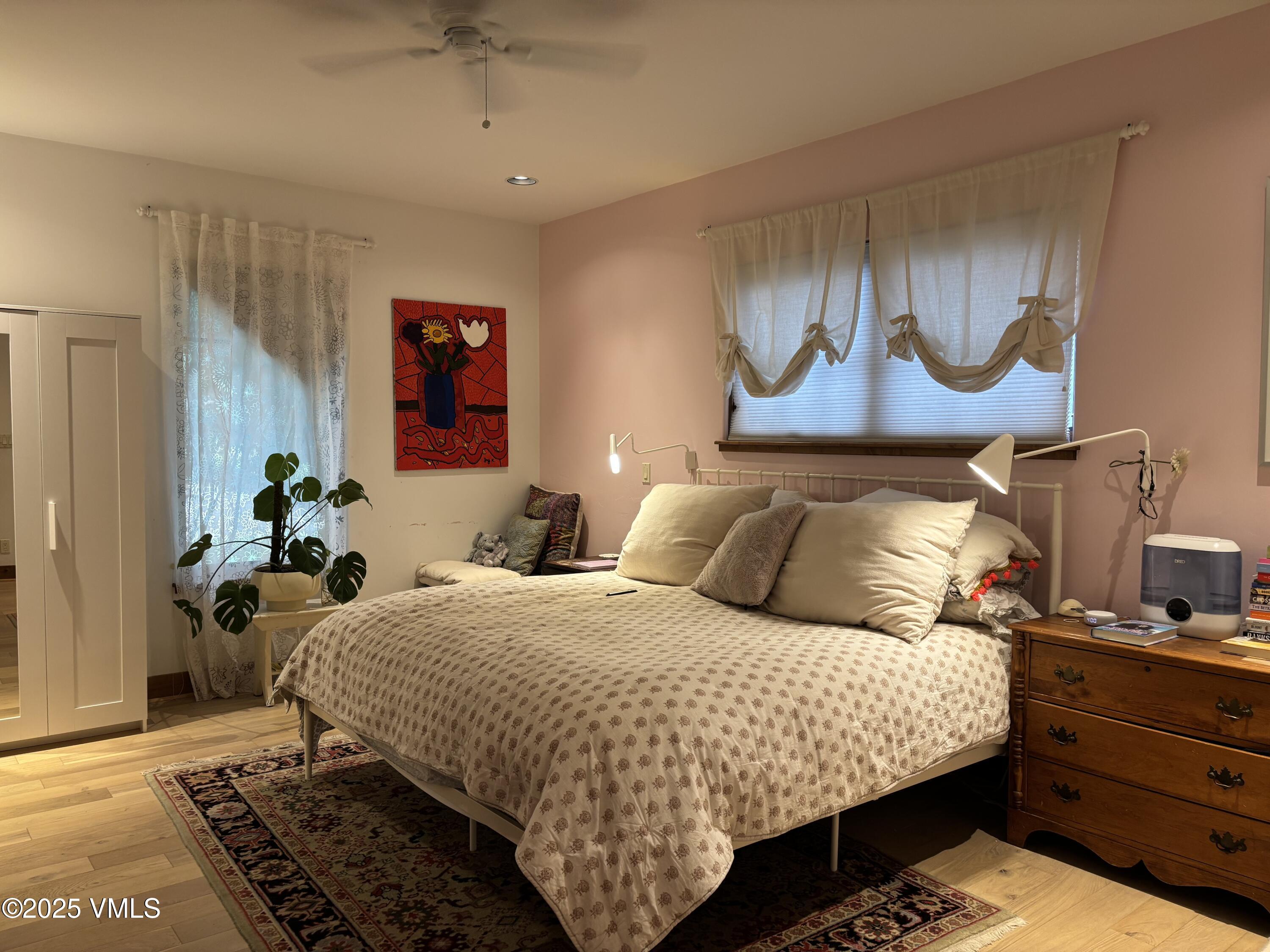 40 Bunker Way Eagle, CO 81631 - Photo 11 of 18 a bedroom with a bed and dresser