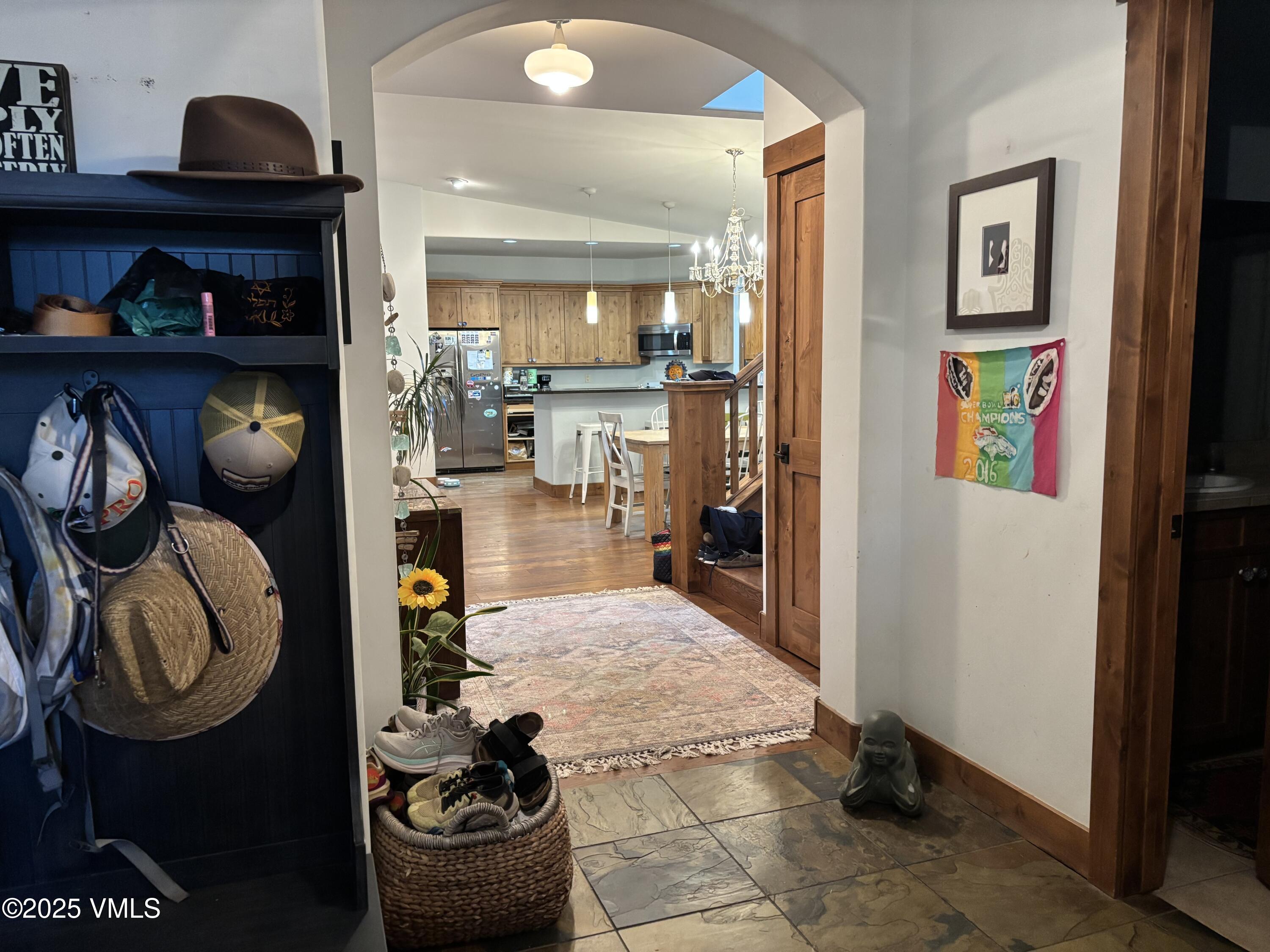 40 Bunker Way Eagle, CO 81631 - Photo 3 of 18 a living room with furniture and a shelf